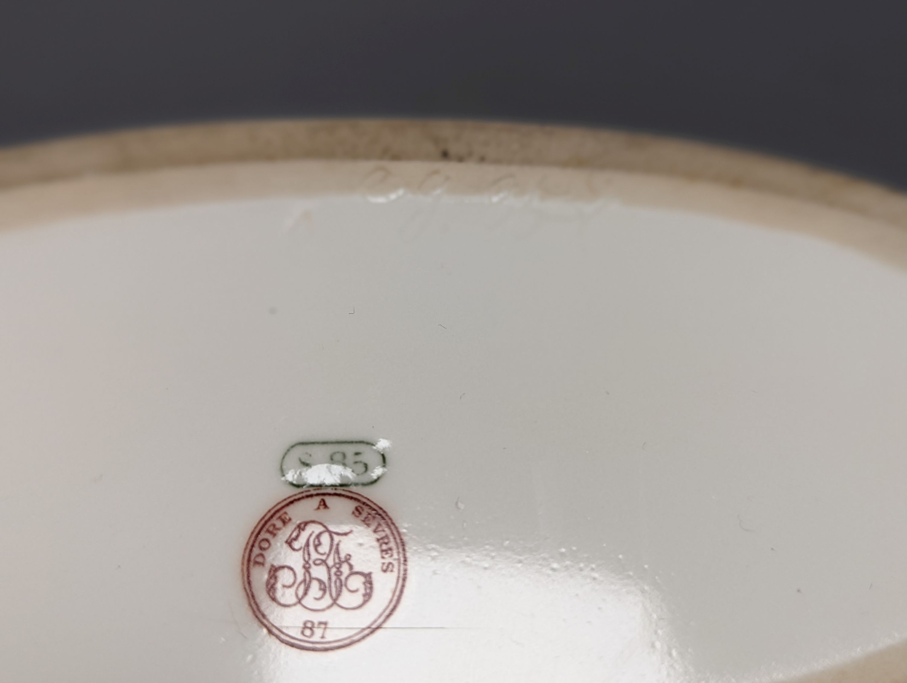 A Sevres style boat shaped dish and a Limoges circular dish, Sevres dish 27 cms wide & Limoges dish 31 cms diameter.